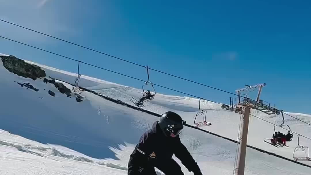Rider sliding a box in the Sierra Nevada snowpark